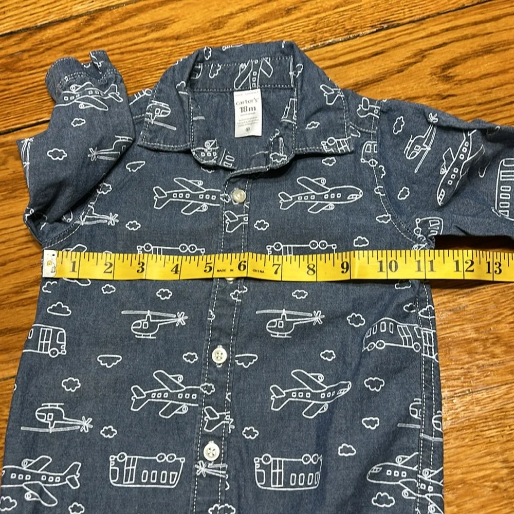 Carter’s blue and white long sleeve shirt. Excellent condition. Size 18 Months.
